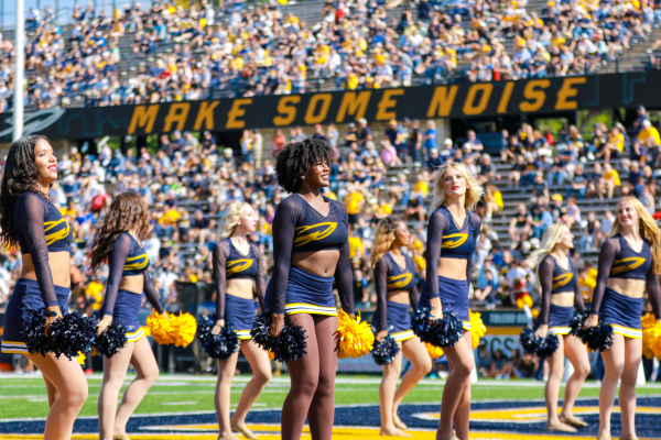 A photo of the Rockettes before a performance in the Glass Bowl